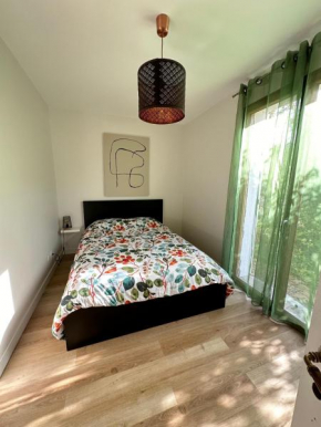 Appartement dans un ecrin de verdure terrasse privee